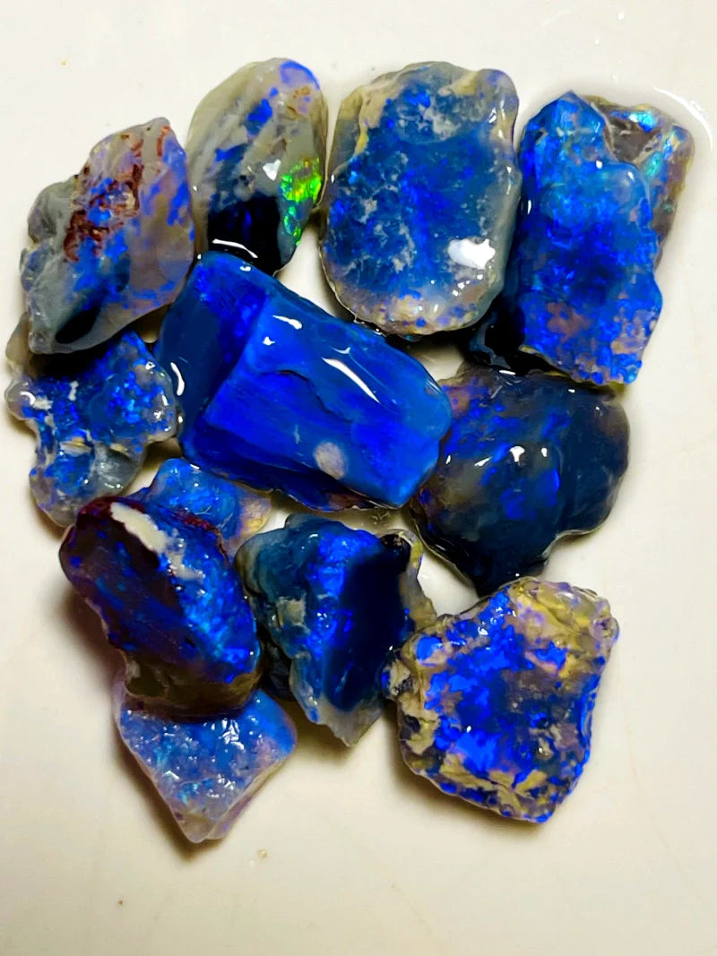 29cts Lightning Ridge Cutters Select Black Super colourful material to cut 15x10x8mm to 8x6x3mm SKU#WAB31